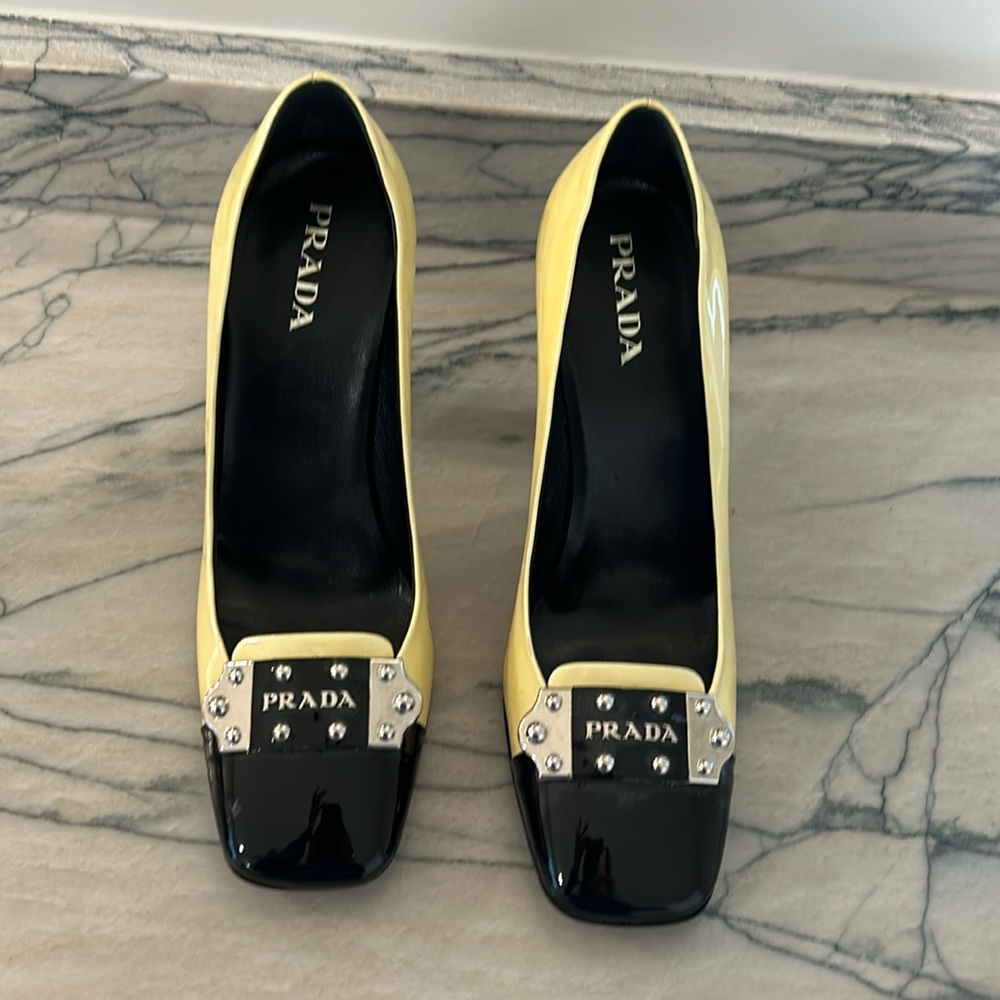 Prada heels only worn inside and on carpet. Several discolorations as depicted